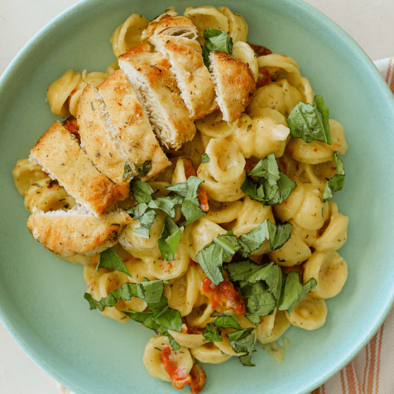 Creamy Tuscan Pasta with Herby Breaded Chicken