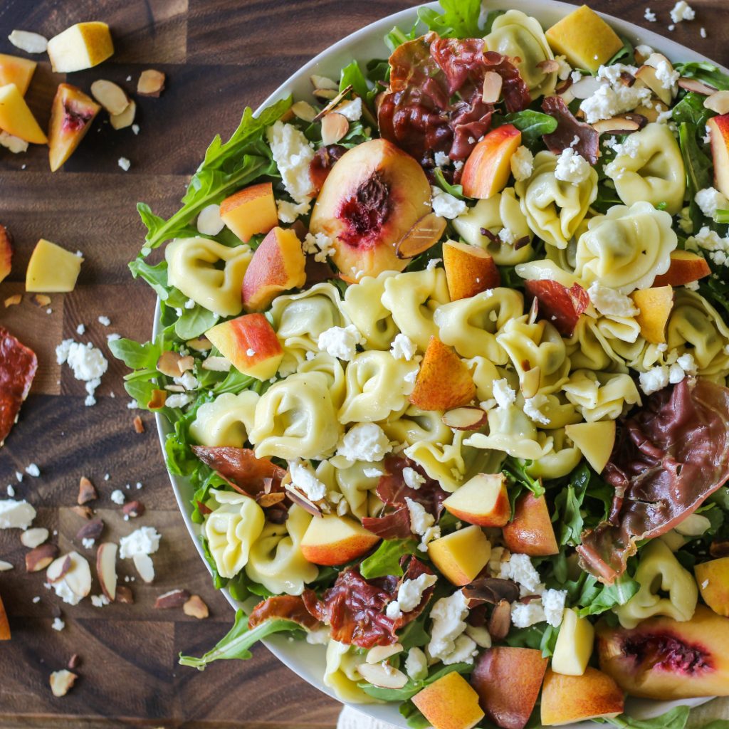 peach-tortellini-and-arugula-salad-with-crispy-prosciutto-mozie