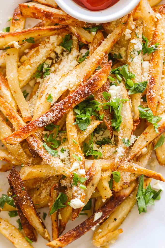 Crispy Baked Tajin Garlic Parmesan Fries