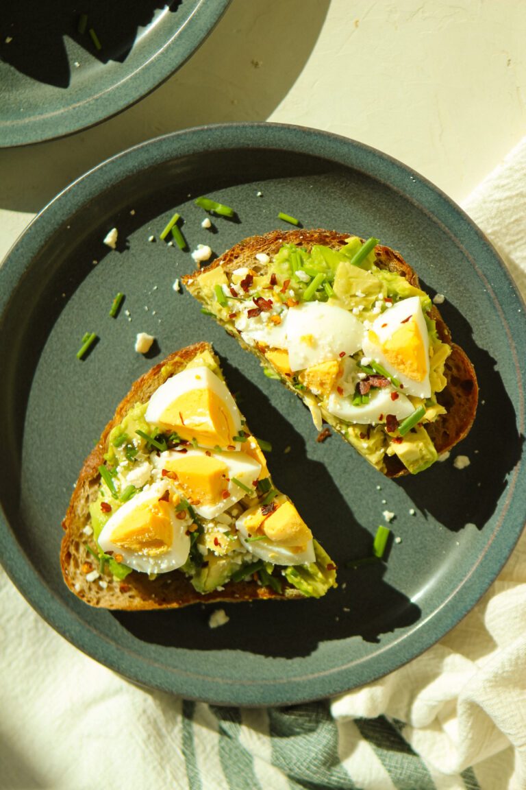 avocado toast with egg feta cheese and chives