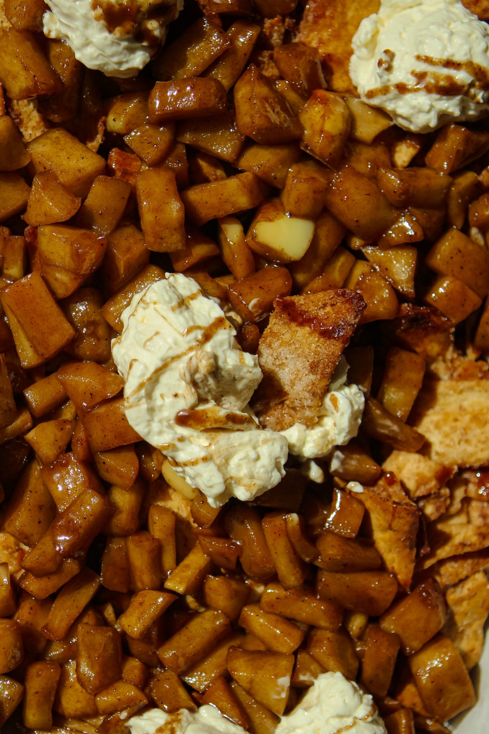 sheet pan cinnamon apple nachos topped with whipped cream cheese dip