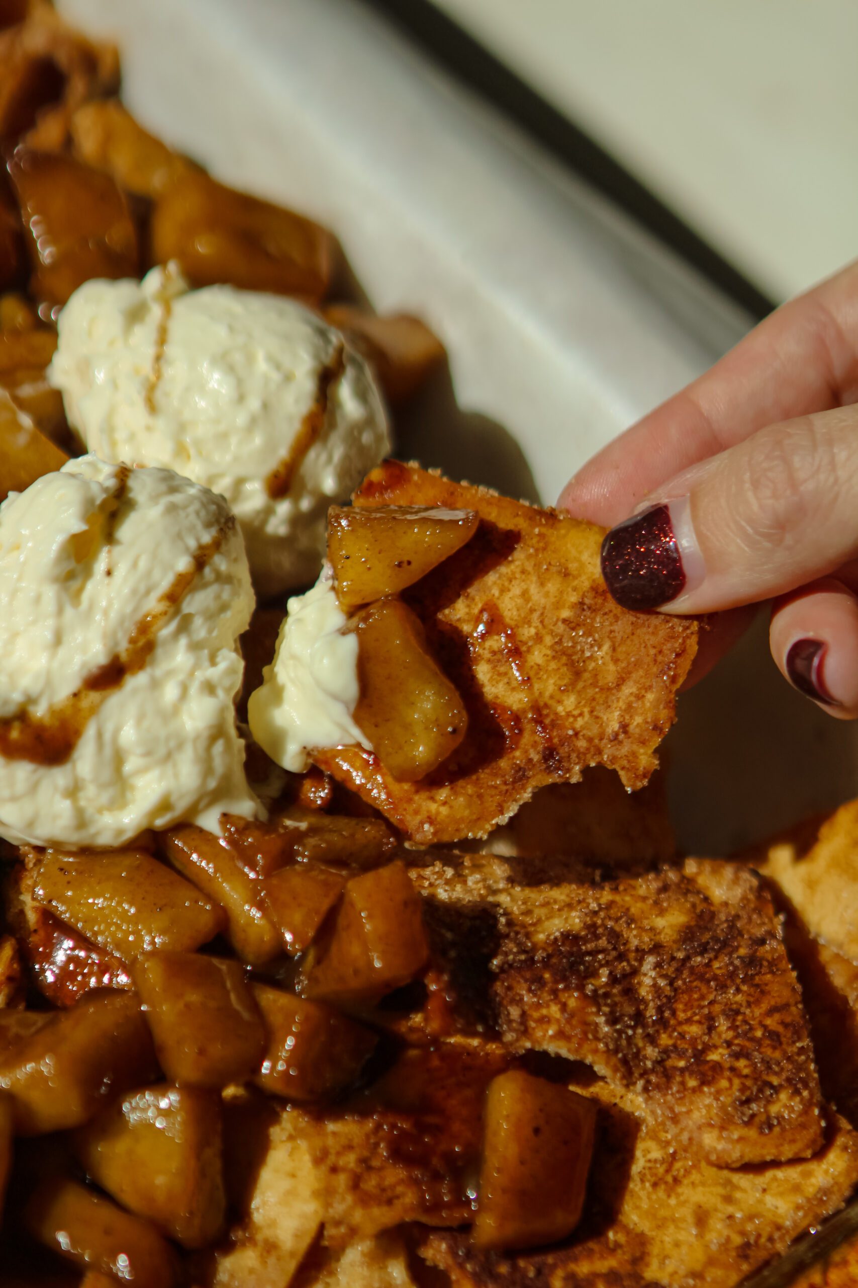 close-up of sheet pan cinnamon apple nachos