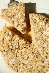 slice of pumpkin coffee cake with cinnamon streusel topping