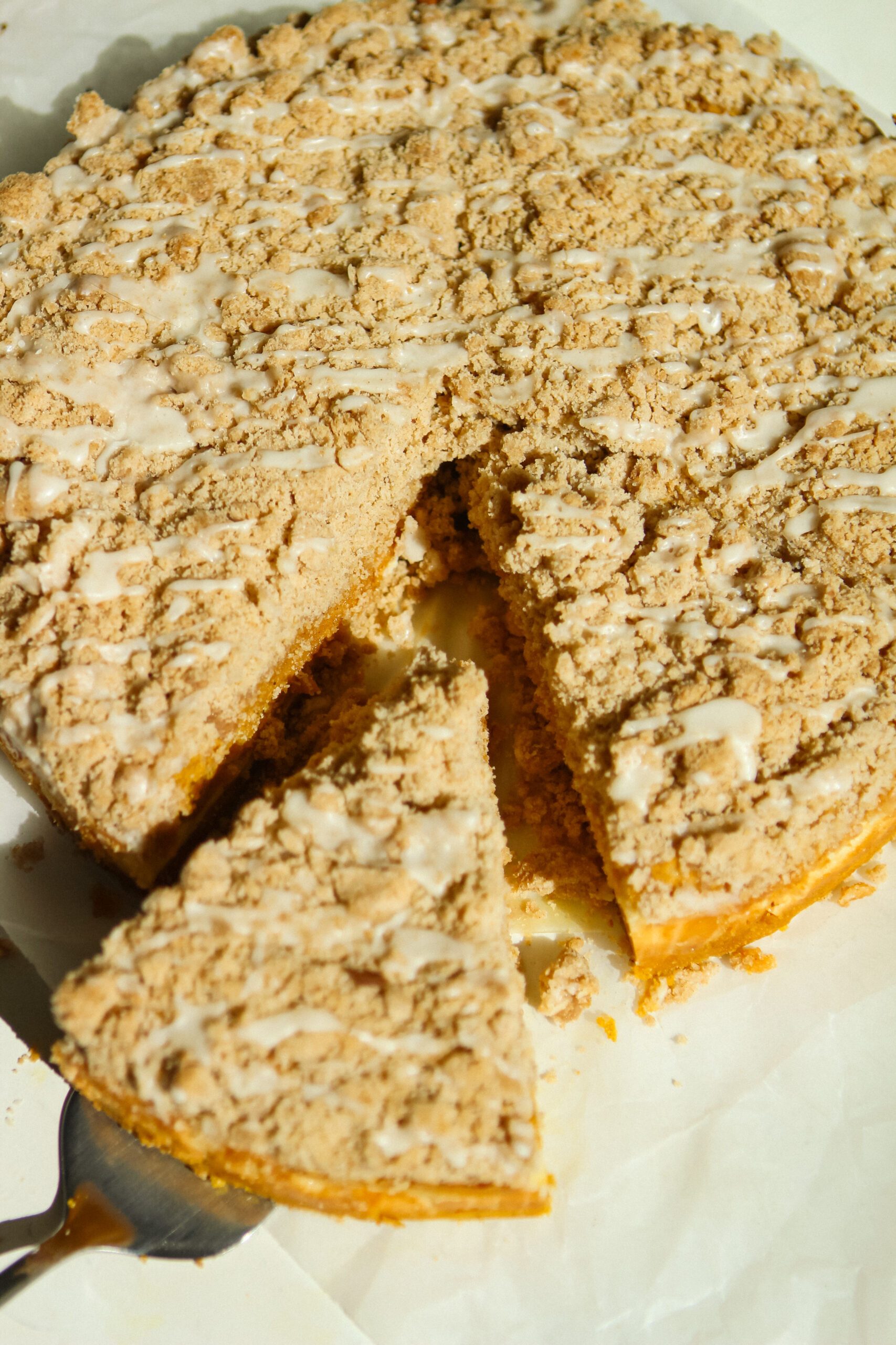 slice of pumpkin coffee cake with cinnamon streusel topping