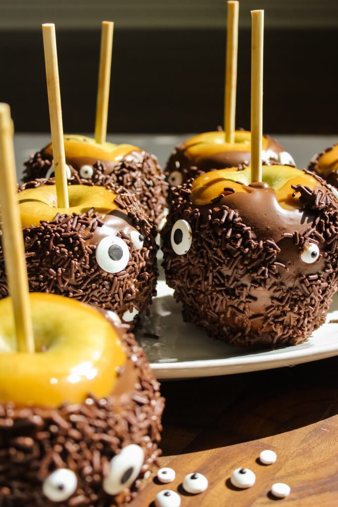 Halloween Monster Caramel Apples Coated in Chocolate