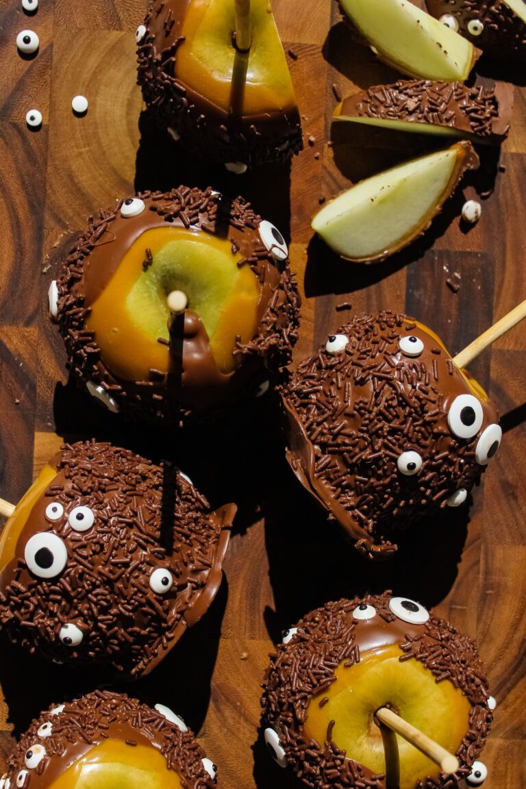 Halloween Monster Caramel Apples Coated in Chocolate