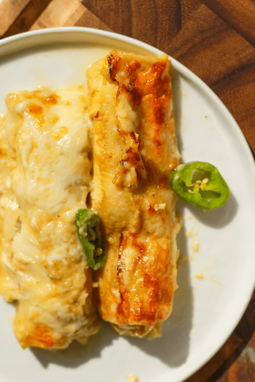 white and green chicken enchiladas