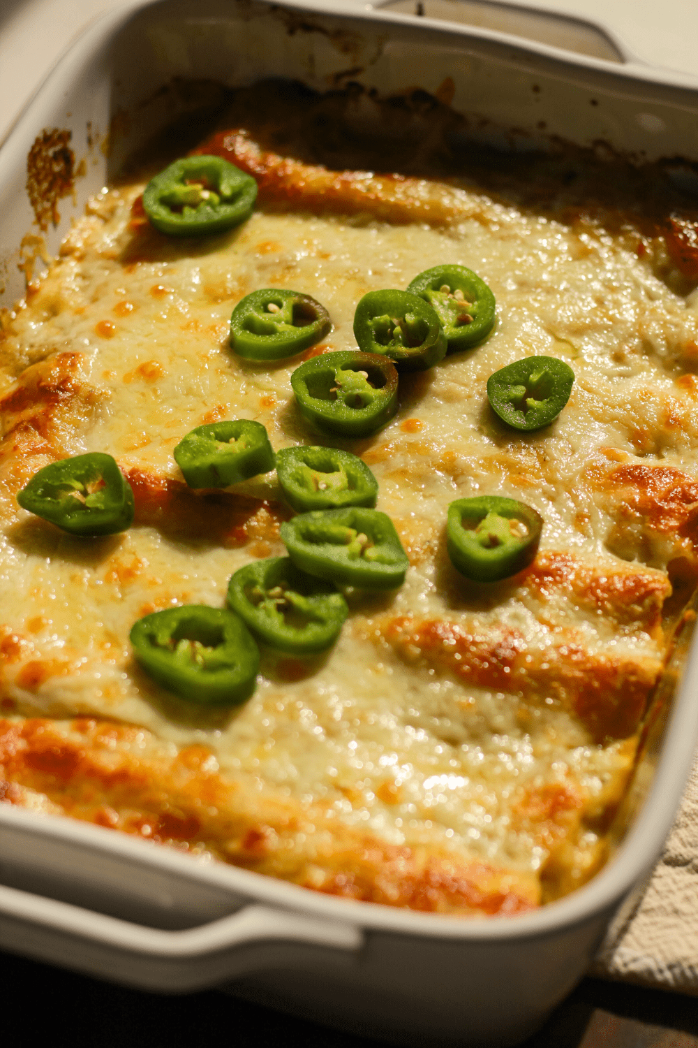 white and green chicken enchiladas
