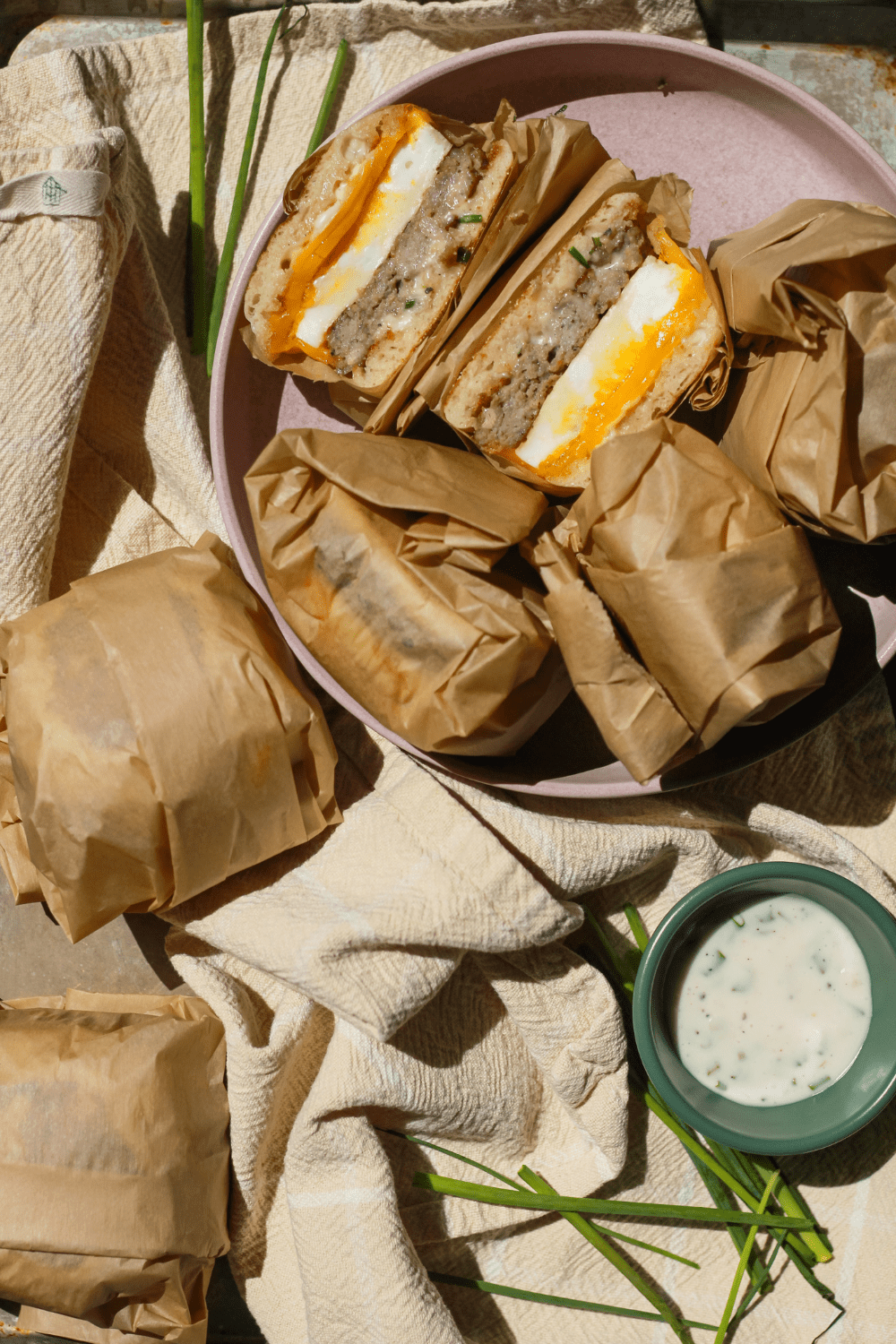 Cheesy Egg and Maple Sausage Sandwiches with Chive Aioli Sauce